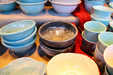 multi-colored ceramic dishes covered with enamel