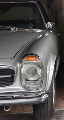 Plakat Partial view of a silver, well-known and popular sporty roadster from Germany from the 60s and 70s