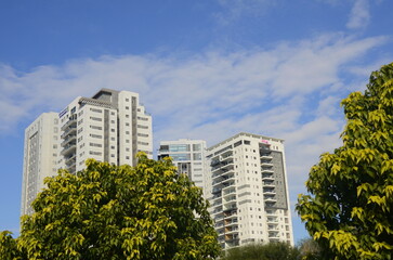 Fototapeta na wymiar real estate in israel. Beautiful new buildings, apartment buildings. Modern housing. Concept: investment, loan, mortgage, rent, sale
