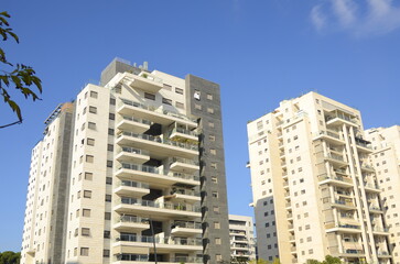 real estate in israel. Beautiful new buildings, apartment buildings. Modern housing. Concept: investment, loan, mortgage, rent, sale