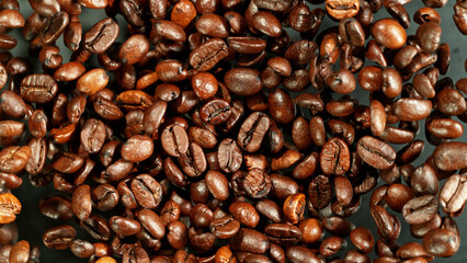 Coffee beans flying in the air in freeze motion.