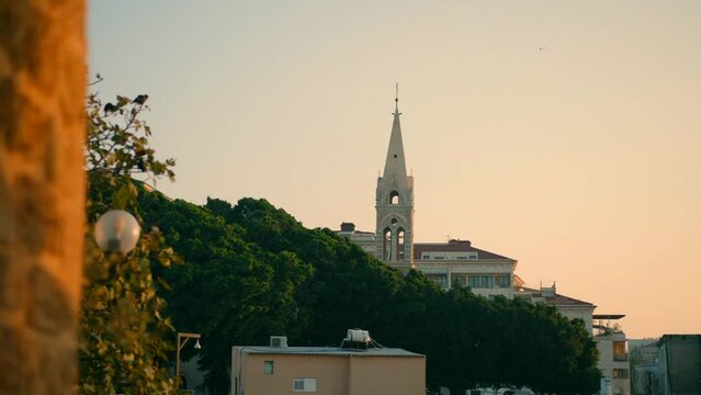 Beautiful shot of a sunset view of a church in Jaffa Israel.