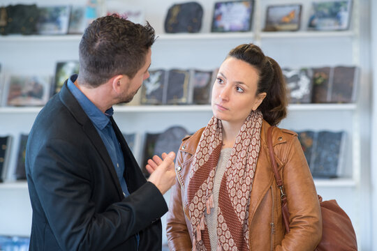 client talking to a mortuary service person