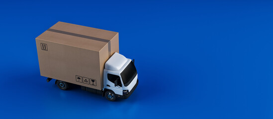 Big cardboard box package on a white truck ready to be delivered