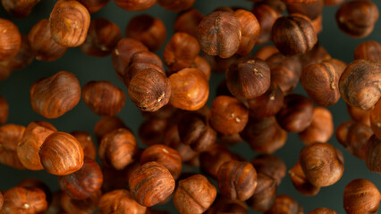Freeze Motion Shot of Flying Whole Hazelnuts, Close-up