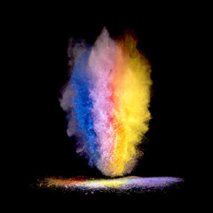 Colored powder explosion isolated on black background. Abstract colored backdrop. Colorful explode.
