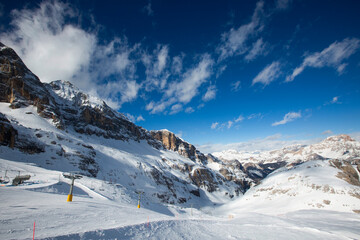 Ski slope in the alps Dolomites - 559463623