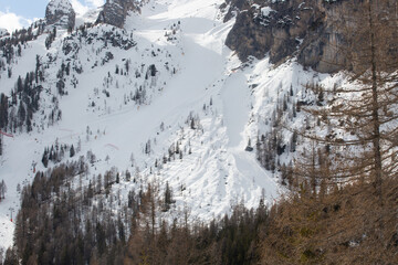 Ski slope in the alps Dolomites - 559463878