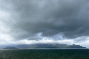 thunderstorm on the sea in the mountains, cloudy before rain