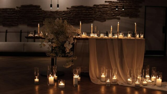 wedding table decor with candles in a restaurant