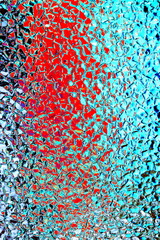 Textured background of corrugated wavy glass. Abstract relief pattern on the glass surface. Colorful embossed pattern, background. Changed color scheme.