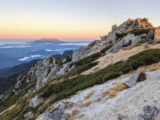 Mt. Ontake at sunrise seen from Mt. Utsugi in October. Okuwa Village, Nagano Prefecture, Japan 