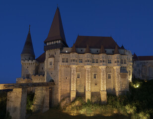 Fototapeta na wymiar Corvin (Hunyadi) Castle of Hunedoara at dusk, blue hour timelapse