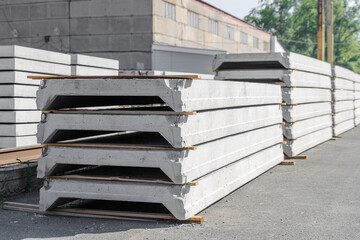 A stack of reinforced concrete slabs for the roof of industrial buildings.