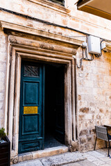 Open door of a building on a street in the old town of Dubrovnik. Croatia.