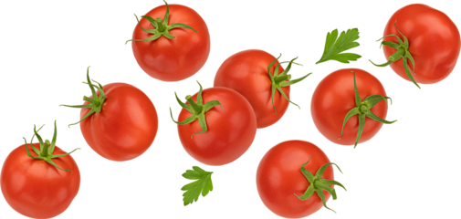 Falling cherry tomatoes isolated