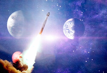 Shuttle launch in the clouds to outer space. Dark space with stars on background.Spaceship flight. Elements of this image furnished by NASA
