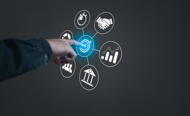 Leadership in organisation Setting goals, visions, strategies for business growth and success concept. Businessman touching technology virtual screen with target board and icons on background.