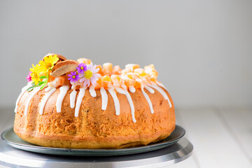 Bael Fruit Cake decorated with small flowers on top, sweet and healthy dessert, homemade cake