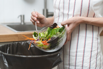 Food waste environment concept, people throwing food garbage into bin prepare to decompose.