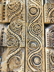 Floral Motfis decoration in the wall of Qutb Minar complex at New Delhi, India. Relief carving at...
