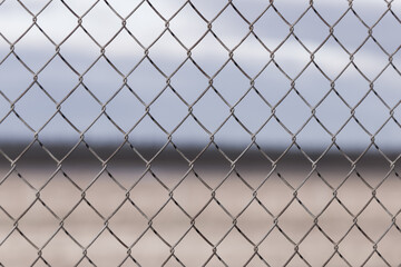 Fototapeta premium Chickenwire fence useable as background or banner