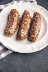 Bavarian sausage meat fresh ground pork, beef meal food snack on the table copy space food background rustic top view