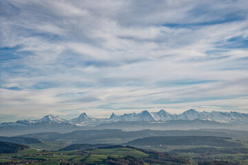 view of the bernese alps in Switzerland during a hazy day, copy space