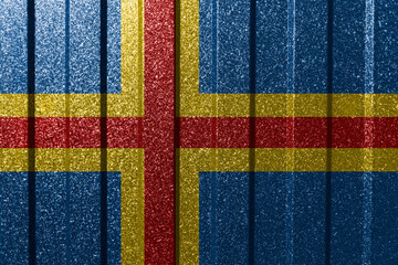 Textured flag of Aland on metal wall. Colorful natural abstract geometric background with lines.