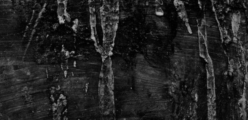 Fototapeta na wymiar Energetic background image of cracked and eroded old cement wall.