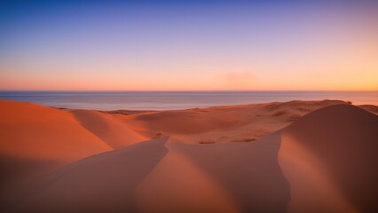 Fototapeta na wymiar Seaside with dunes at sunset.