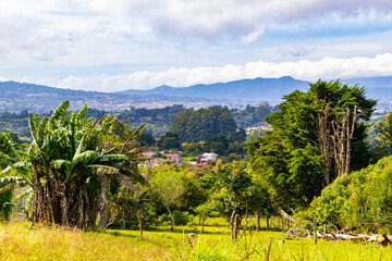 Beautiful mountain landscape city panorama forest trees nature Costa Rica.