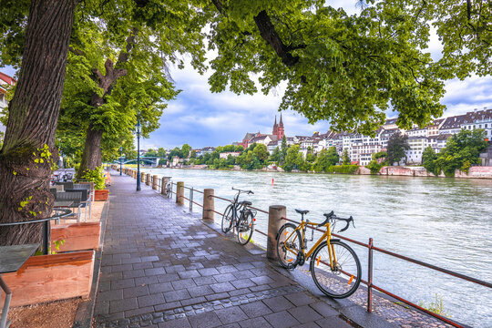 Basel. Rhine river green waterfront and Basel Minster view © xbrchx