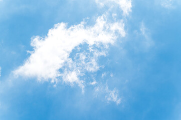 Obraz premium Beautiful white fluffy clouds in blue sky. Nature background from white clouds in sunny day