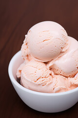 Variety of ice cream scoops in cones with chocolate and vanilla. IA Tehnology