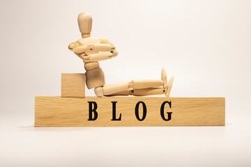 Blog written on wooden surface. Wooden Concept