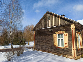 Old wooden houses and buildings in the snow