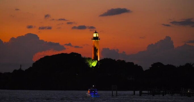 View to the Jupiter lighthouse on the north side of the Jupiter Inlet at sunset.