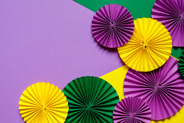 Mardi gras.Holidays mardi gras masquarade, venetian mask  fan over purple background. view  above,mardi gras background copy space Happy Mardi Gras . Fat Tuesday carnival texture golden,green purple