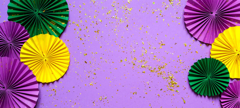 Mardi gras.Holidays mardi gras masquarade, venetian mask  fan over purple background. view  above,mardi gras background copy space Happy Mardi Gras . Fat Tuesday carnival texture golden,green purple