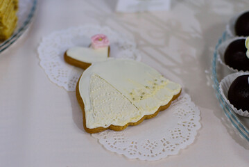 Wedding dress cookies on the table