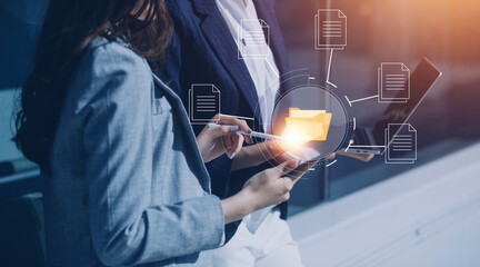 Document management system concept, business man holding folder and document icon software, searching and managing files online document database, for efficient archiving and company data.