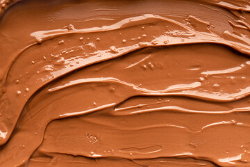 Chocolate background. Melted chocolate. Chocolate swirl.