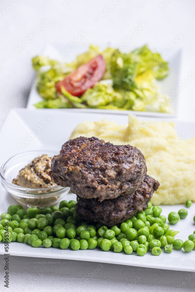 Poster bavarian meat loafs with peas