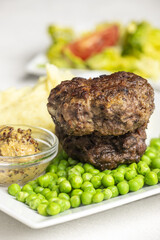 bavarian meat loafs with peas