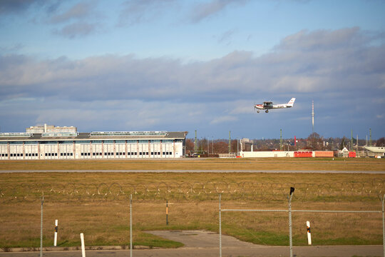 Cessna 152 aircraft on approach to Stuttgart International Airport. Small plane landing. Stuttgart, Germany.