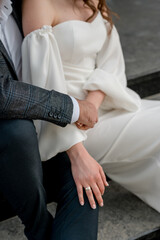 Bride and groom holding hands