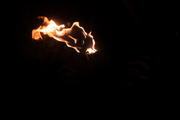 Fire and burning torches at bonfire celebration, 5th November 2022, Lewes, Sussex © Anders93