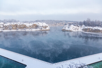 View of the winter lake Zakrzówek in Krakow, Poland
