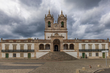 Fototapeta na wymiar Sanctuary of Our Lady of Nazaré, Portugal with dramatic skies in the background
